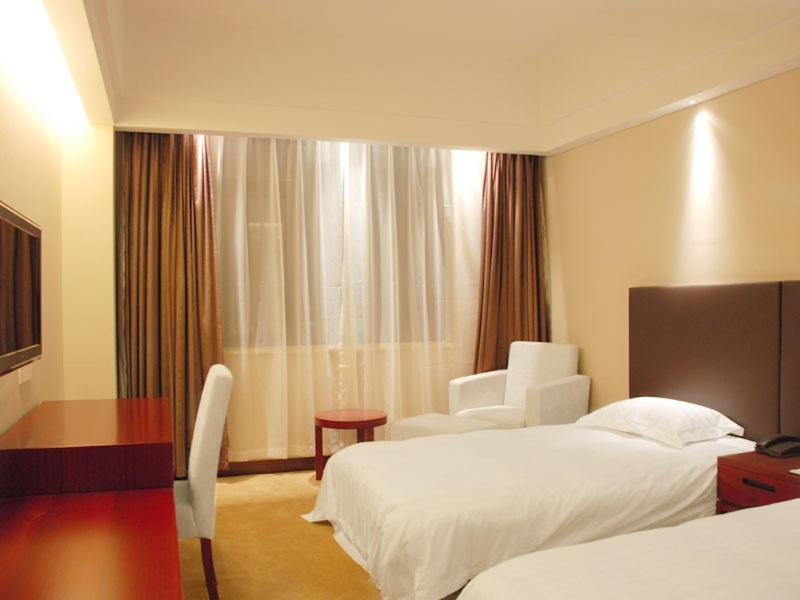 Starway Ganyuan Hotel Sanghaj Szoba fotó